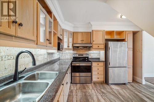 2102 - 100 Mornelle Court, Toronto, ON - Indoor Photo Showing Kitchen With Double Sink