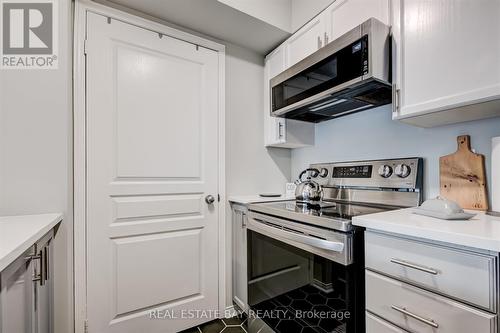 310 - 1797 Queen Street E, Toronto, ON - Indoor Photo Showing Kitchen