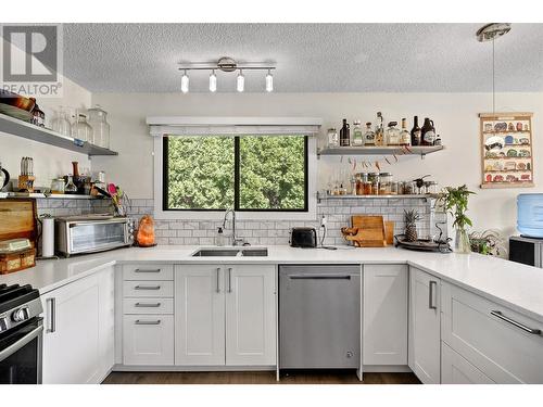 750 Mcclure Road, Kelowna, BC - Indoor Photo Showing Kitchen With Double Sink