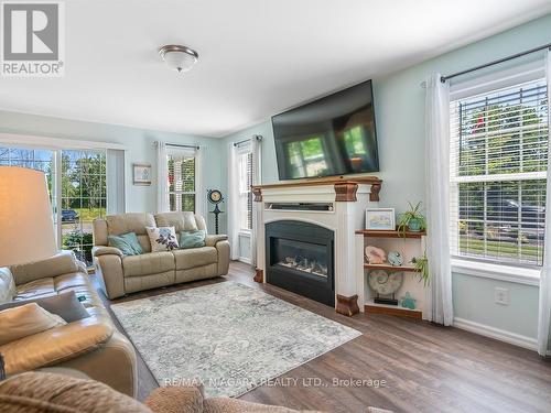 3545 Firelane 7, Port Colborne, ON - Indoor Photo Showing Living Room With Fireplace