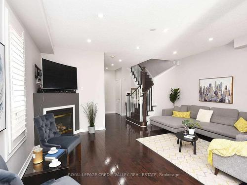 5638 Longboat Ave, Mississauga, ON - Indoor Photo Showing Living Room With Fireplace