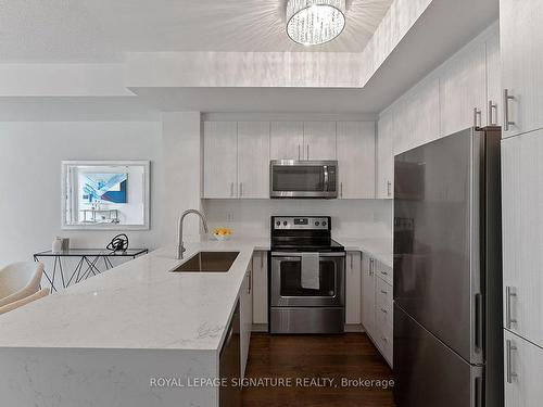 23-150 Long Branch Ave, Toronto, ON - Indoor Photo Showing Kitchen With Upgraded Kitchen