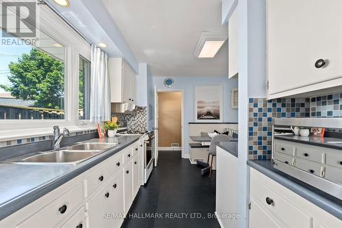 4 Panmure Crescent, Toronto, ON - Indoor Photo Showing Kitchen With Double Sink
