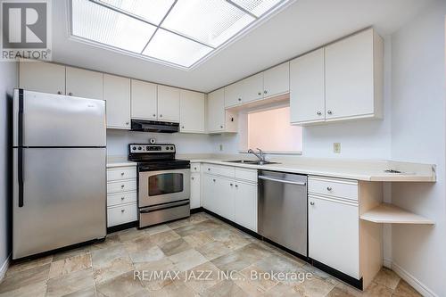 204 - 1 Heritage Way, Kawartha Lakes, ON - Indoor Photo Showing Kitchen With Double Sink