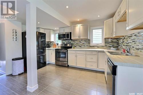 4036 4Th Avenue, Regina, SK - Indoor Photo Showing Kitchen With Double Sink With Upgraded Kitchen