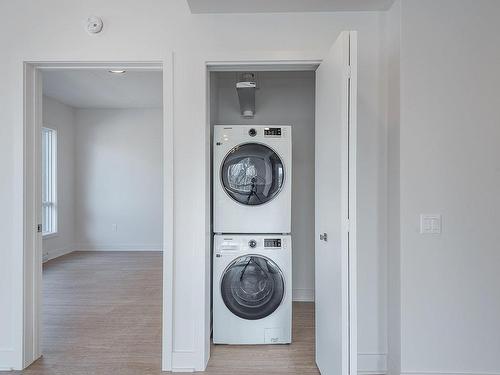 Salle de lavage - 211-65 Rue William-Macdonald, Montréal (Lachine), QC - Indoor Photo Showing Laundry Room