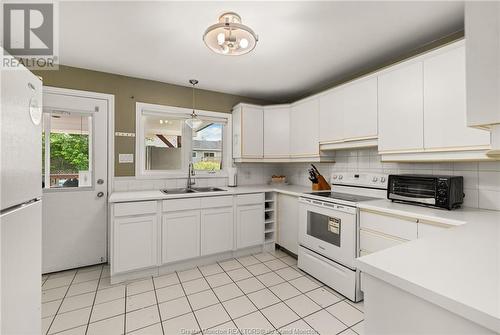 24 Anne, Moncton, NB - Indoor Photo Showing Kitchen With Double Sink