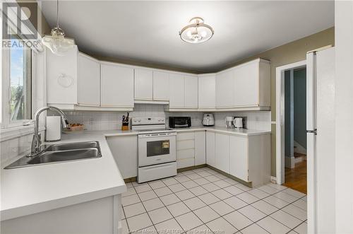 24 Anne, Moncton, NB - Indoor Photo Showing Kitchen With Double Sink