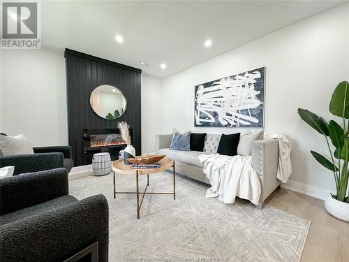 1107 Highland, Windsor, ON - Indoor Photo Showing Living Room With Fireplace