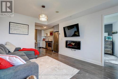 1405 - 9 Valhalla Inn Road, Toronto, ON - Indoor Photo Showing Living Room With Fireplace