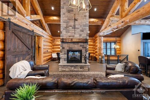 255 Maclarens Side Road, Ottawa, ON - Indoor Photo Showing Living Room With Fireplace