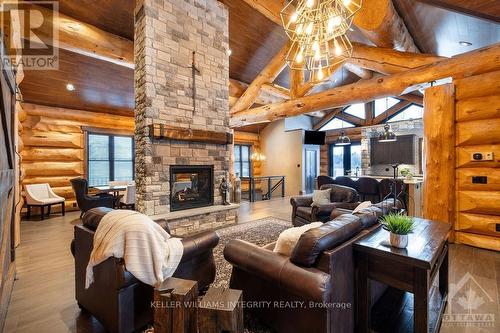 255 Maclarens Side Road, Ottawa, ON - Indoor Photo Showing Living Room With Fireplace