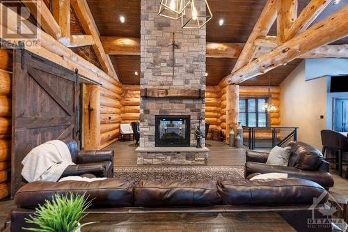 255 Maclarens Side Road, Ottawa, ON - Indoor Photo Showing Living Room With Fireplace