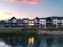 105-2735 Shannon Lake Road, Kelowna, BC  - Outdoor With Body Of Water With Facade 