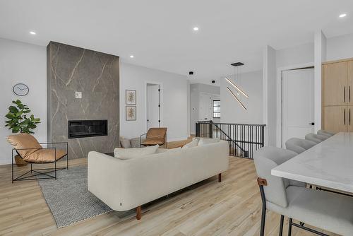 771 Carnoustie Drive, Kelowna, BC - Indoor Photo Showing Living Room With Fireplace