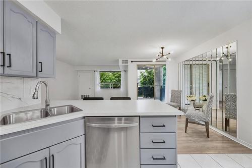 240 Quigley Road|Unit #204, Hamilton, ON - Indoor Photo Showing Kitchen