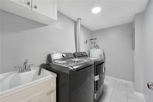 240 Quigley Road|Unit #204, Hamilton, ON - Indoor Photo Showing Laundry Room
