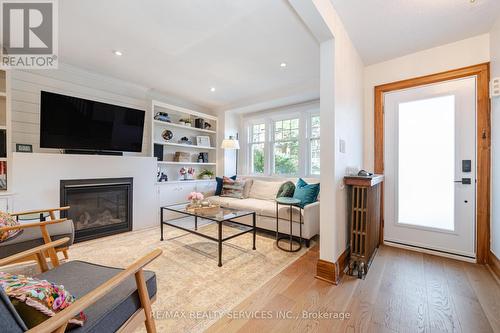 20 Courcelette Road, Toronto, ON - Indoor Photo Showing Living Room With Fireplace