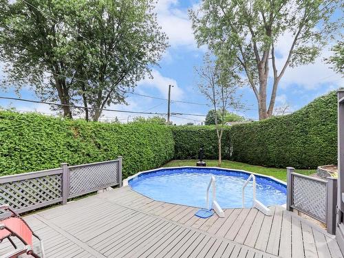 ExtÃ©rieur - 162 Rue Des Hêtres, Saint-Eustache, QC - Outdoor With Above Ground Pool With Backyard