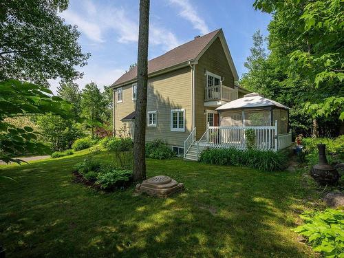 Back facade - 712 Rue Alain, Saint-Colomban, QC - Outdoor With Deck Patio Veranda