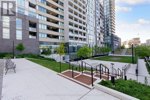521 - 20 Minowan Miikan Lane, Toronto, ON - Outdoor With Balcony With Facade