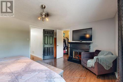 1593 Geta Circle, Pickering, ON - Indoor Photo Showing Bedroom With Fireplace