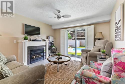 65 Homefield Square, Clarington, ON - Indoor Photo Showing Living Room With Fireplace