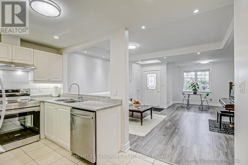 A13 - 108 Finch Avenue W, Toronto, ON - Indoor Photo Showing Kitchen With Double Sink