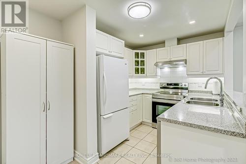 A13 - 108 Finch Avenue W, Toronto, ON - Indoor Photo Showing Kitchen With Double Sink