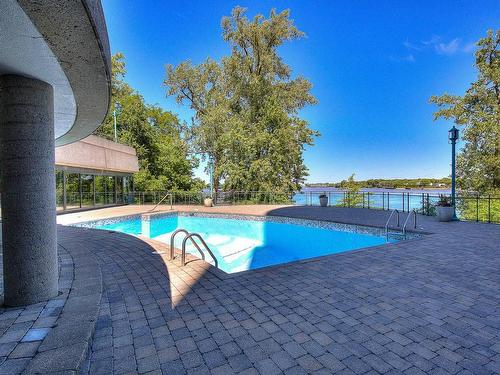 Pool - 203-4450 Prom. Paton, Laval (Chomedey), QC - Outdoor With In Ground Pool With Backyard