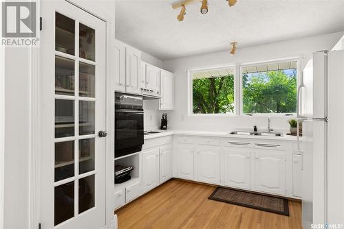 2920 Grant Road, Regina, SK - Indoor Photo Showing Kitchen With Double Sink