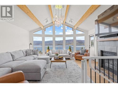 403 Stellar Drive, Kelowna, BC - Indoor Photo Showing Living Room With Fireplace