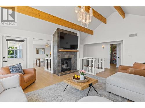 403 Stellar Drive, Kelowna, BC - Indoor Photo Showing Living Room With Fireplace