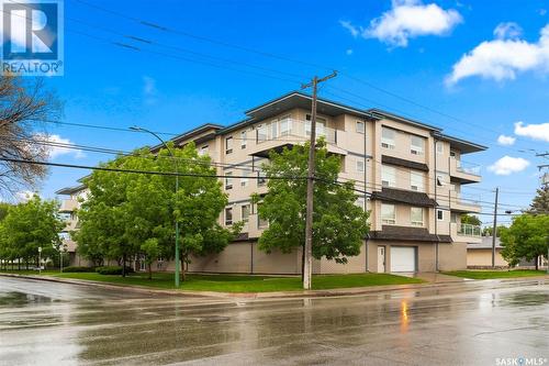 210 215 Smith Street N, Regina, SK - Outdoor With Body Of Water