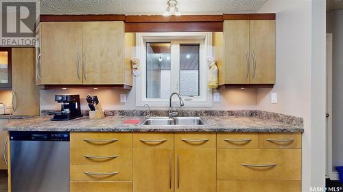 2834 Kutarna Crescent, Regina, SK - Indoor Photo Showing Kitchen With Double Sink