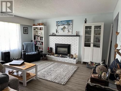 205 Gibbon Road, Williams Lake, BC - Indoor Photo Showing Living Room With Fireplace