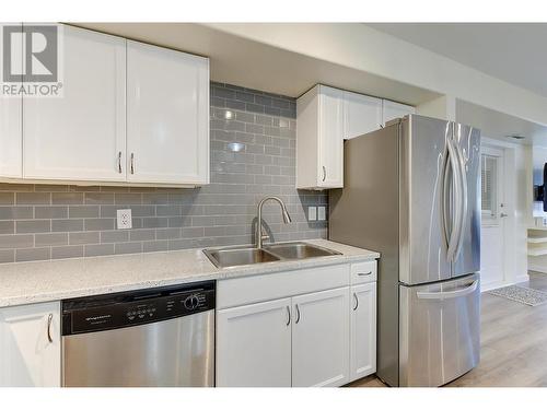 3115 De Montreuil Court Unit# 101, Kelowna, BC - Indoor Photo Showing Kitchen With Double Sink