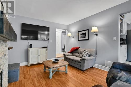 19 Townsend Drive, Ottawa, ON - Indoor Photo Showing Living Room With Fireplace