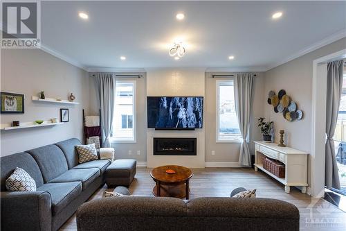 125 Damselfly Way, Ottawa, ON - Indoor Photo Showing Living Room With Fireplace