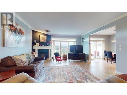 2377 Shannon Woods Drive Unit# 201, West Kelowna, BC - Indoor Photo Showing Living Room With Fireplace