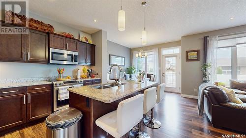 4314 E Green Olive Way, Regina, SK - Indoor Photo Showing Kitchen With Double Sink