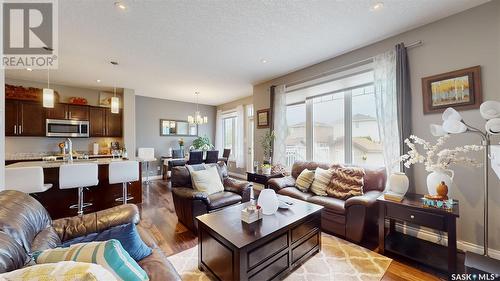 4314 E Green Olive Way, Regina, SK - Indoor Photo Showing Living Room