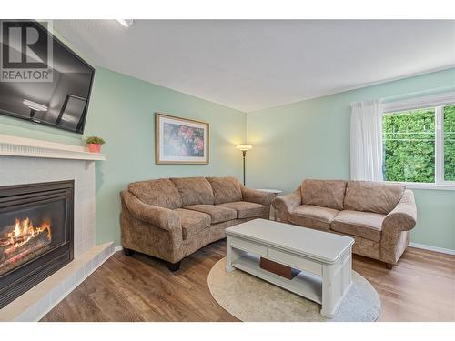 2041 26 Avenue Ne, Salmon Arm, BC - Indoor Photo Showing Living Room With Fireplace