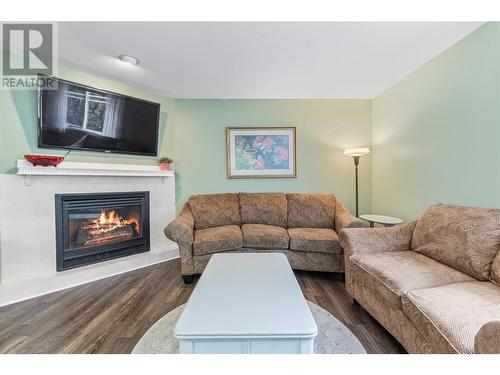 2041 26 Avenue Ne, Salmon Arm, BC - Indoor Photo Showing Living Room With Fireplace