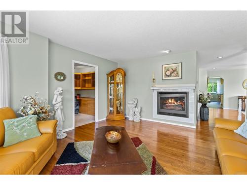 2041 26 Avenue Ne, Salmon Arm, BC - Indoor Photo Showing Living Room With Fireplace