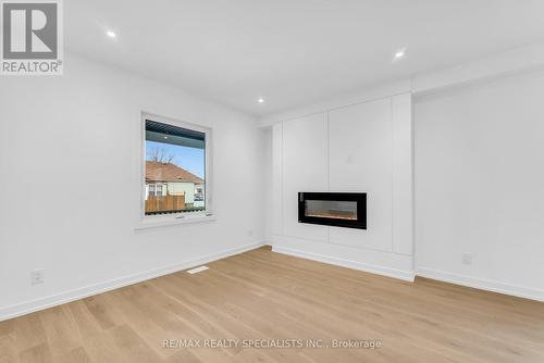 90 Frederick Avenue, Hamilton, ON - Indoor Photo Showing Living Room With Fireplace