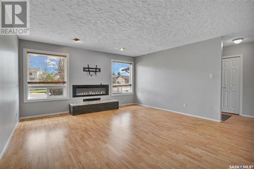 430 David Knight Lane, Saskatoon, SK - Indoor Photo Showing Other Room With Fireplace