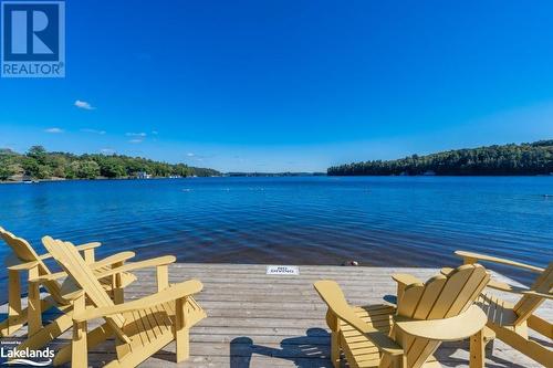 Docks at the beach - 1869 Muskoka 118 Highway W Unit# L204-D1, Muskoka Lakes, ON - Outdoor With Body Of Water With View