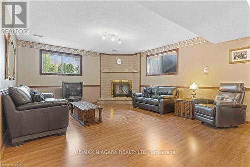 7737 Mount Carmel Boulevard, Niagara Falls, ON - Indoor Photo Showing Living Room With Fireplace