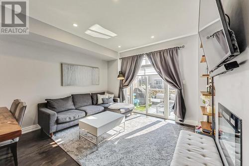 1022A Islington Avenue, Toronto, ON - Indoor Photo Showing Living Room With Fireplace